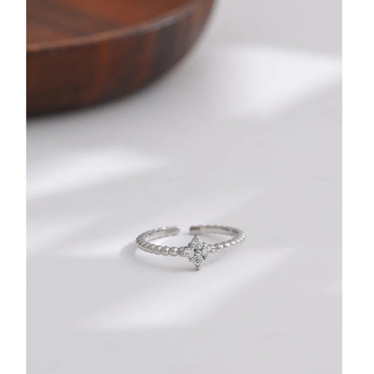 NYXORA Stainless Steel Cubic Zirconia Flower